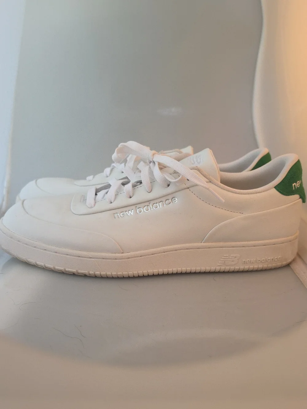 New Balance White Sneakers with Green Heel Accent